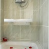 Drop down shower seat with adjustable legs Drop down shower seat with adjustable legs